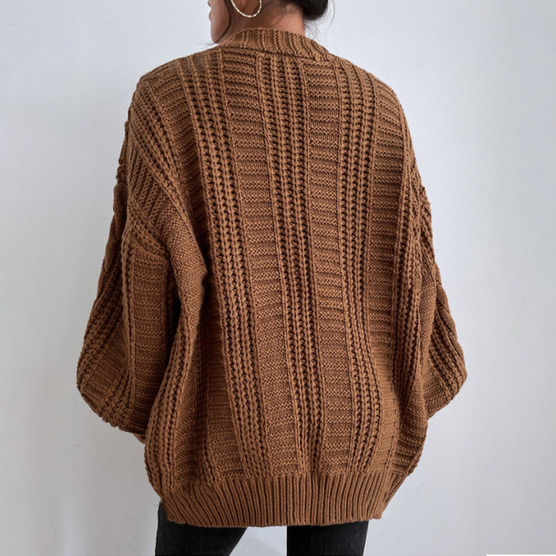 V-Ausschnitt  Twist Strickmantel
